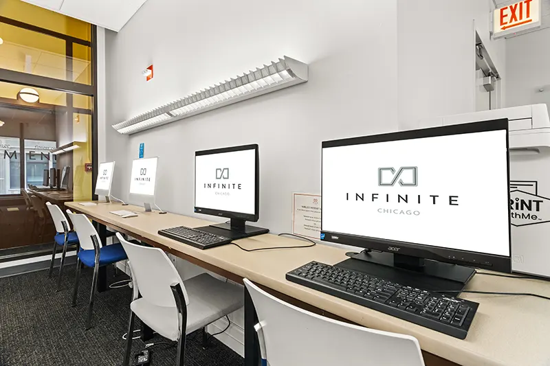Modern student business center equipped with printing station and computers